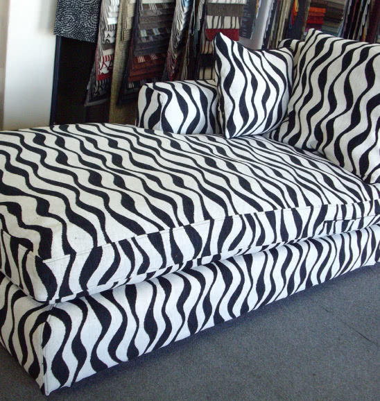 black and white swirl patterned couch